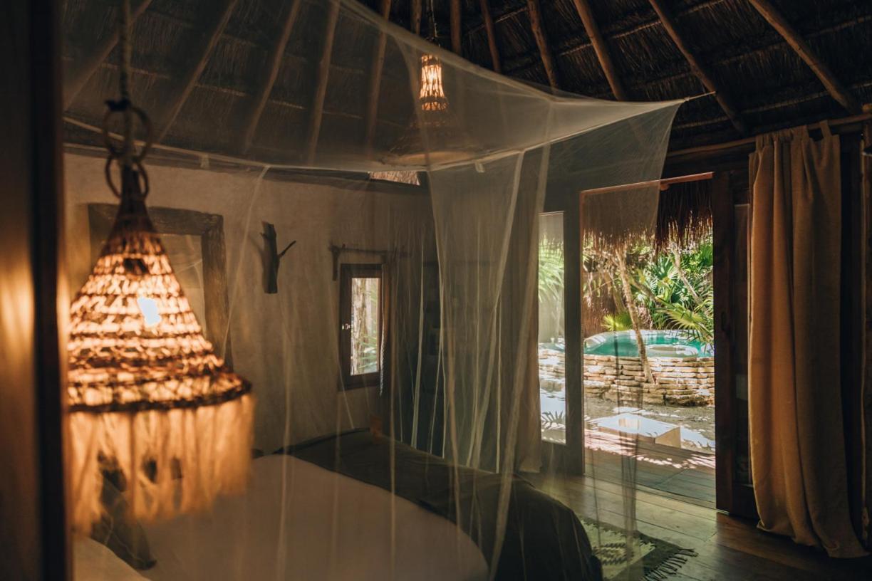 Ikal Tulum Hotel Luaran gambar Interior of a bungalow